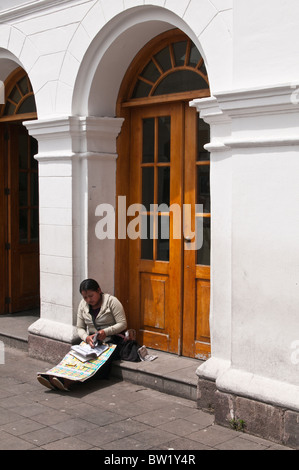 Woman selling lottery tickets, Historic Center, Quito, Ecuador. Stock Photo