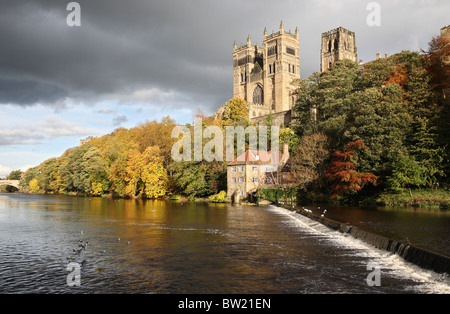 Durham cathedral and the old fulling mill, seen across the river Wear, with the mill weir in the foreground. Stock Photo