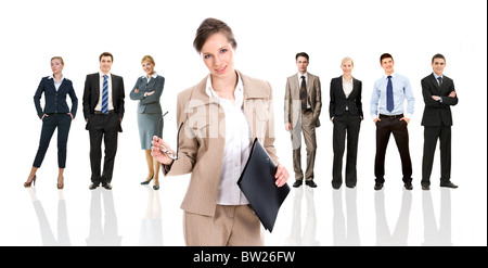 Row of several business people in different poses with pretty leader in front Stock Photo