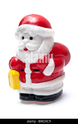 Santa claus carrying a gift isolated on white Stock Photo