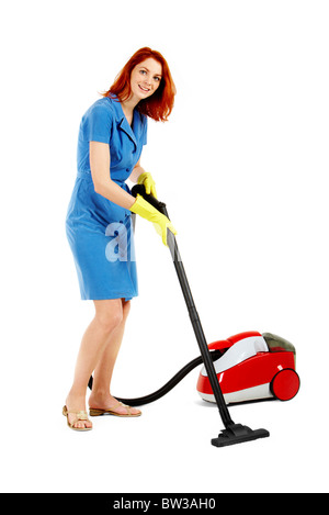 Portrait of nice housewife doing housework with vacuum cleaner Stock Photo