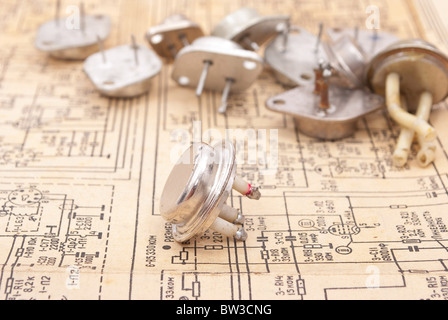Old transistors laid out on the electronic circuit Stock Photo