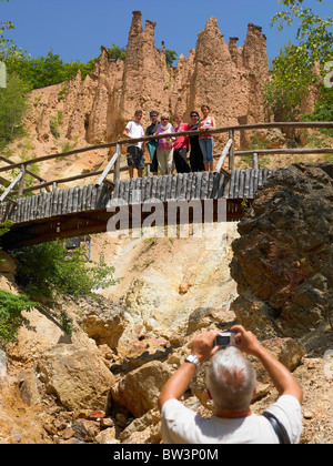 Tourists in Devil's Town, Natural Phenomenon In Serbia Stock Photo