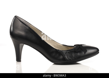 Womens black shoe with a heel on a white background Stock Photo