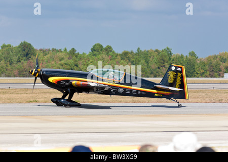 Patty Wagstaff flying her Extra 300S during a performance in air show at NAS Jacksonville, Florida Stock Photo