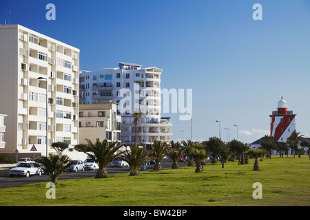 Apartment blocks and Green Point Lighthouse, Green Point, Cape Town, Western Cape, South Africa Stock Photo