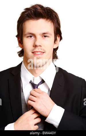 Vertical image of elegant businessman looking at camera Stock Photo