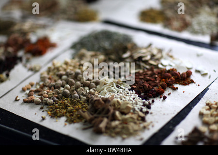 Personal presciptions being prepared at the Fulintang Traditional Chinese Herbal Medicine Store in Kunming, China. Stock Photo