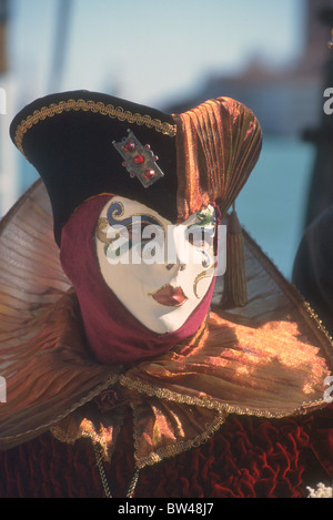 Revellers in costume at the Venice carnival, in St Mark's Square, Italy ...