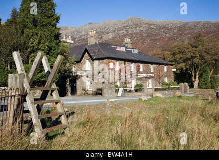 Footpath stile by the Pen-y-Gwryd hotel pub the Glyderau mountains in Snowdonia National Park. Nant-y-Gwryd, North Wales, UK Stock Photo