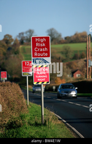 Signs Warning of High Risk Crash Route and Casualty Statistics on the Fosse Way Rural Road, Warwickshire Stock Photo