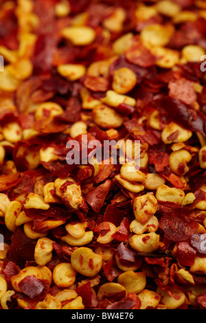 Macro photograph of a large number of dried chilli flakes Stock Photo