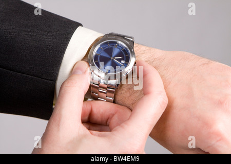 Hand ready to stop chronograph in a modern watch. Stock Photo