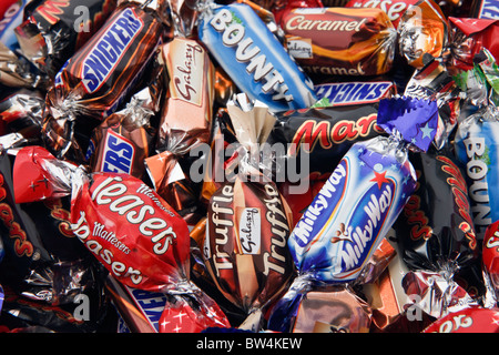 Foil wrapped Celebrations chocolates. Mars, Malteasers, Milky Way, Bounty, Galaxy, Snickers. England, UK, Britain. Stock Photo