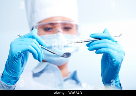 Image of dentist with medical tools Stock Photo