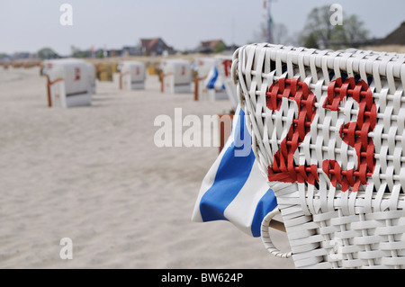 Beach chairs on the beach near Neustadt at Baltic Sea, Schleswig-Holstein, Germany Stock Photo