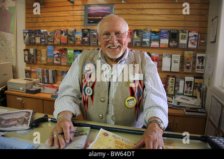Senior man volunteer at Tourist Information Center in Old Town, Albuquerque, New Mexico, United States, June 17, 2010 Stock Photo