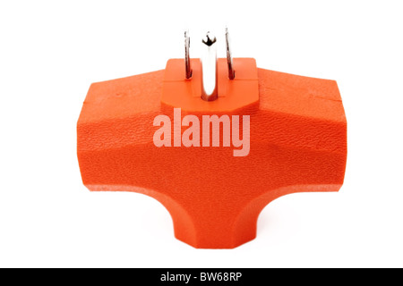 Orange 3 outlet grounded electrical plug adapter isolated on white background Stock Photo