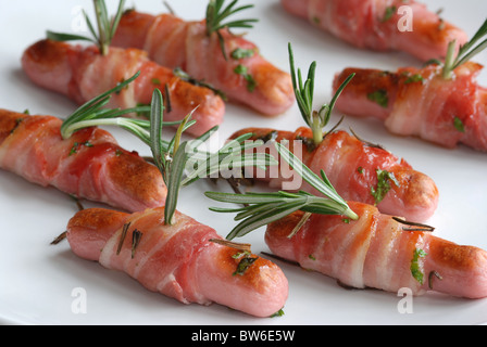 Honey-glazed pigs in blankets Stock Photo