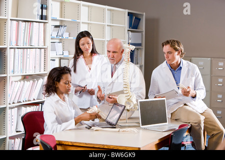 Medical team discussion in library Stock Photo