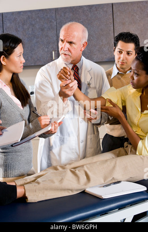 Students learning from medical school professor Stock Photo
