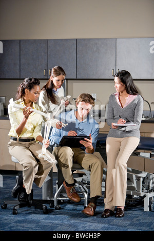 Medical students in lab working on project Stock Photo