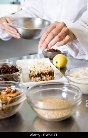 Ingredients for healthy gourmet dessert, putting on final touch Stock Photo