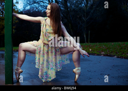 Portrait of a ballerina posing en pointe (on toes), Waterlow Park, Highgate, N6, London, England, UK Stock Photo