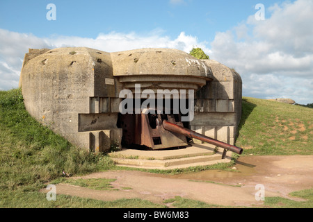 A 150mm gun in one of the four casements of the Longues-sur-Mer Battery, situated west of Arromanches-les-Bains in Normandy. Stock Photo