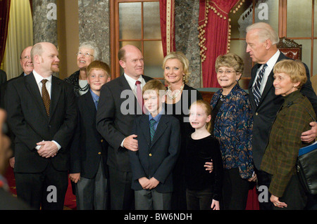 Vice President Joe Biden stands for photos after a ceremonial swearing-in of Sen. Chris Coons, D-Del., in the Capitol's Old Sena Stock Photo