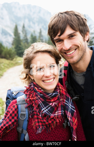 Couple with backpacks portrait Stock Photo