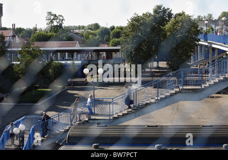 Pedestrians on a bridge over the railway, Brest, Belarus Stock Photo