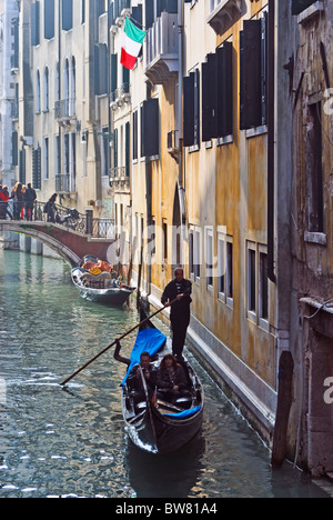 A gondola on a quiet canal in Venice, Italy Stock Photo