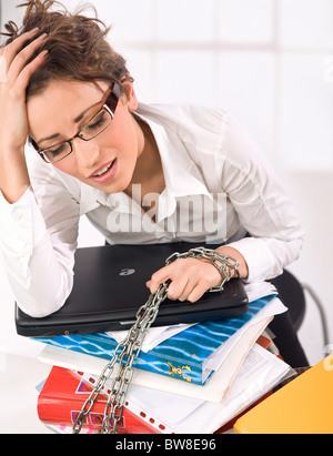 Young overworked secretary Stock Photo