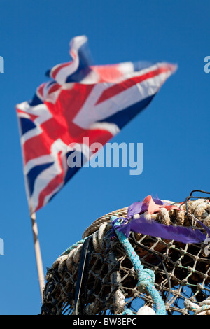 Lobster Pot and Union Jack Flag, Beesands, South Devon, England, UK Stock Photo