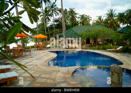 Poincianna Resort in the tropical village of Tejakula, Bali, Indonesia. An idyllic spot with a gorgeous pool and garden. Stock Photo