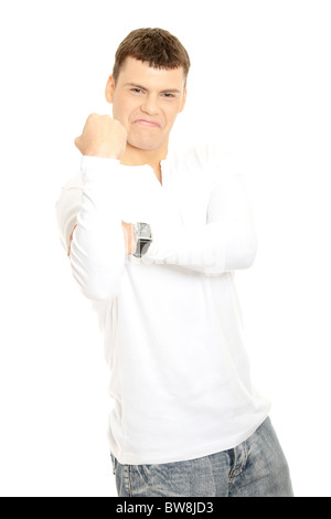 Portrait of man in white shirt showing fist gesture, isolated on white background Stock Photo