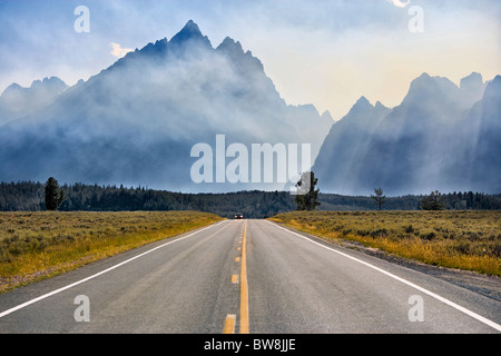 Mount Teton in Grand Teton National Park Wyoming. Jenny Lake Loop Road Scenic byway. Smoke from controlled fires. Stock Photo