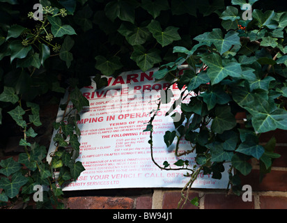 clamping warning sign in private car park in UK Stock Photo