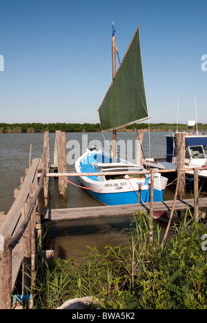 fishing boat with a traditional Gaff rig moored at Gorino, in the Po Delta, Emilia Romagna, Italy Stock Photo