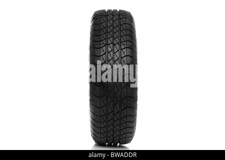 Photo of a car tyre (tire) isolated on a white background Stock Photo