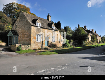 The main street in Whittington, Gloucestershire, UK Stock Photo