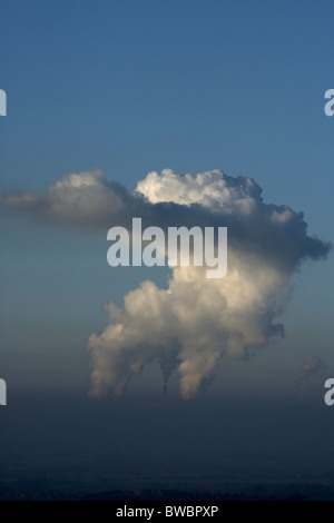 Giant steam clouds rising from the cooling towers at Drax coal fired power station, Selby, Yorkshire, UK. Stock Photo