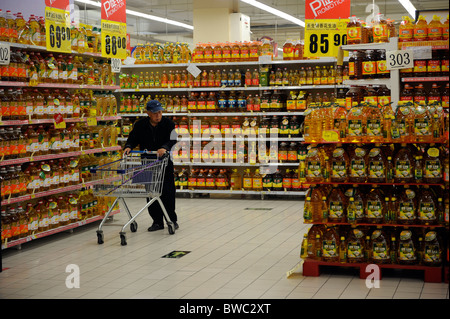 Cooking oil are on sale  in Tesco in Qingdao, Shandong province, China. 12-Nov-2010 Stock Photo