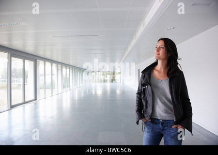 Woman in empty office space Stock Photo