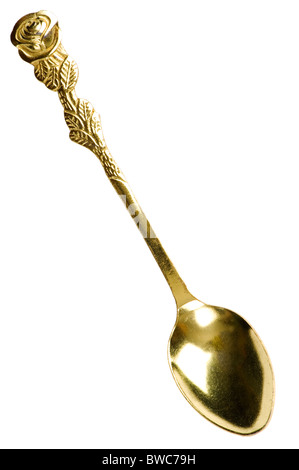 object on white - yellow spoon close up Stock Photo