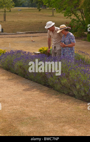 Visitors looking at the lavender at Redisham Hall open gardens in Redisham , Suffolk , England , Great Britain , Uk Stock Photo