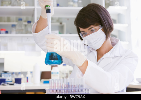 Female scientist doing research in laboratory Stock Photo