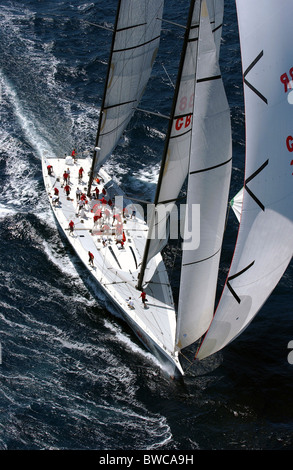 Mari Cha IV under full sail racing off Falmouth Harbour during Antigua Race Week, 2004. Stock Photo