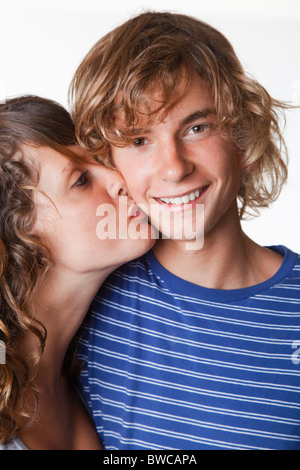 USA, California, Fairfax, Teen girl kissing boyfriend (14-15) Stock Photo